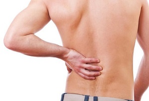 Что болит спина внизу слева что это